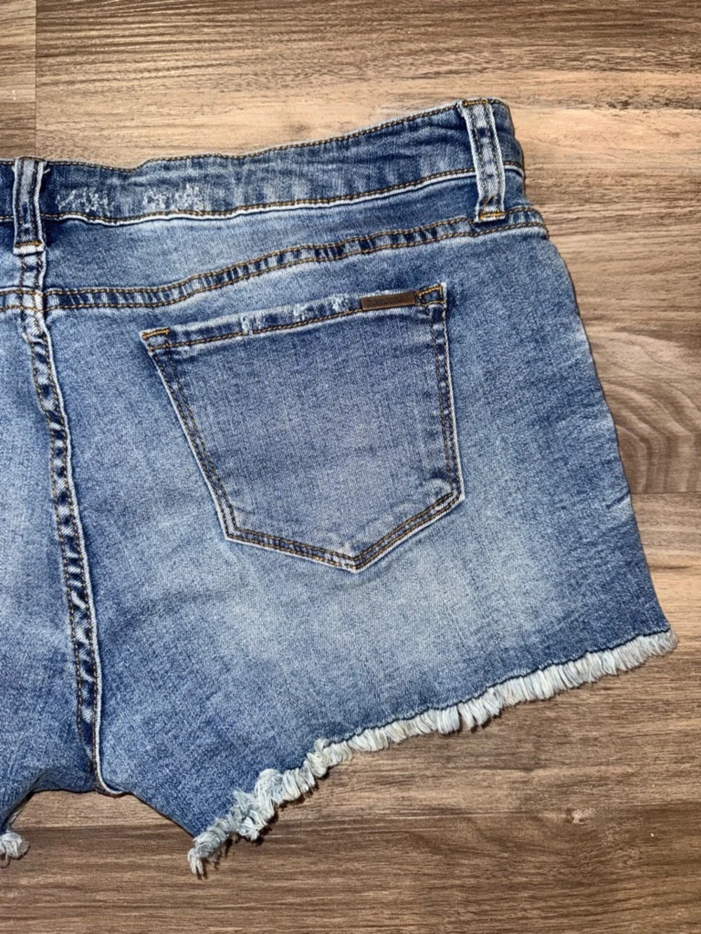 STS Blue distressed denim shorts in a light wash with trendy frayed hem.Size 31. - Picture 2 of 9